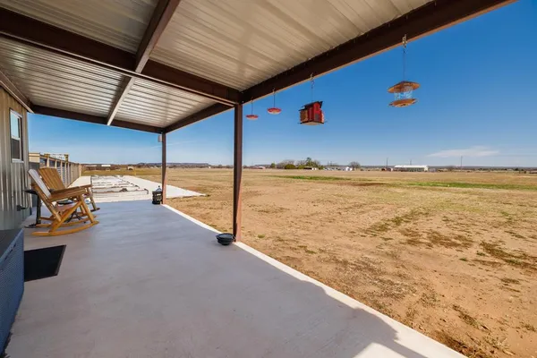 a view of a livingroom with furniture