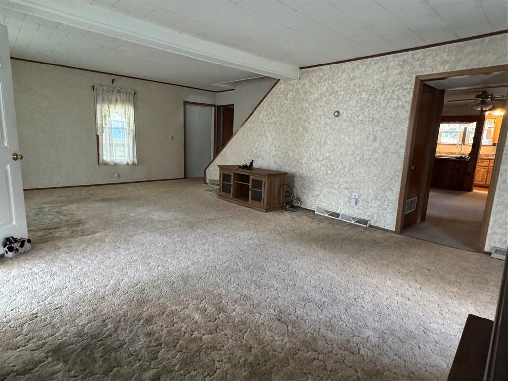 11 Coolspring Street Mercer, PA 16137 - Photo 17 of 30 a view of a livingroom with furniture and windows