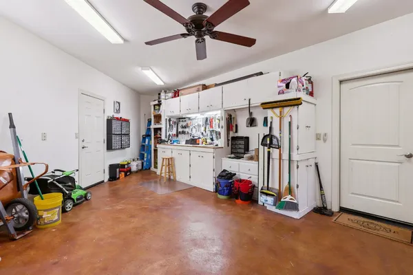 a dining room with furniture and a yard