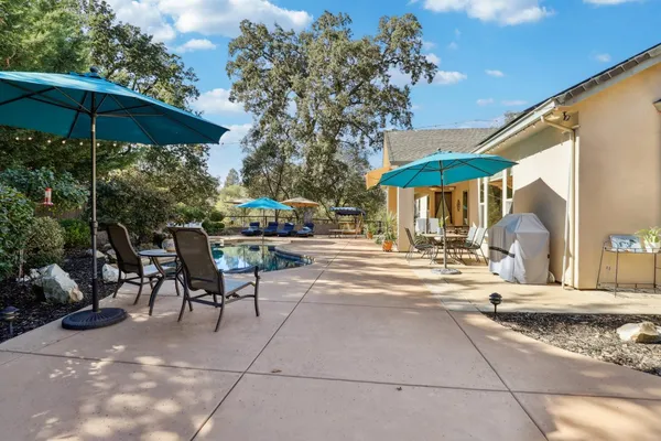 a view of a street with a patio