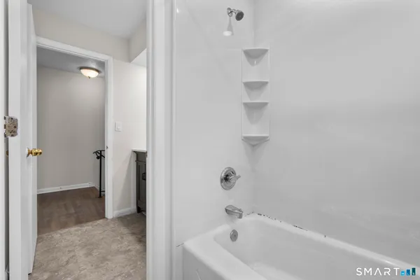 a bathroom with a bathtub