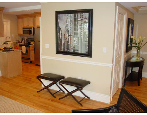 12 Russell Road, Unit 202 Wellesley, MA 02482 - Photo 12 of 15 a living room with furniture and a window