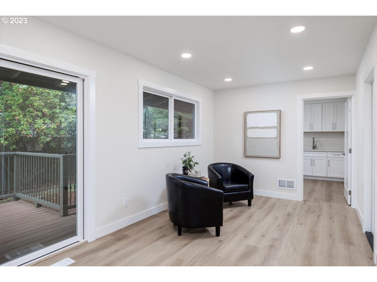 4011 Southwest 43rd Avenue Portland, OR 97221 - Photo 16 of 46 a living room with furniture and a window