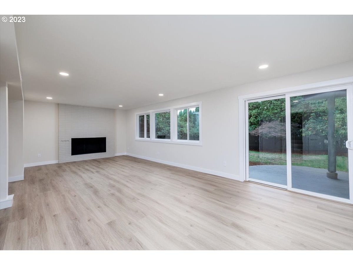 4011 Southwest 43rd Avenue Portland, OR 97221 - Photo 24 of 46 a view of empty room with wooden floor and fan