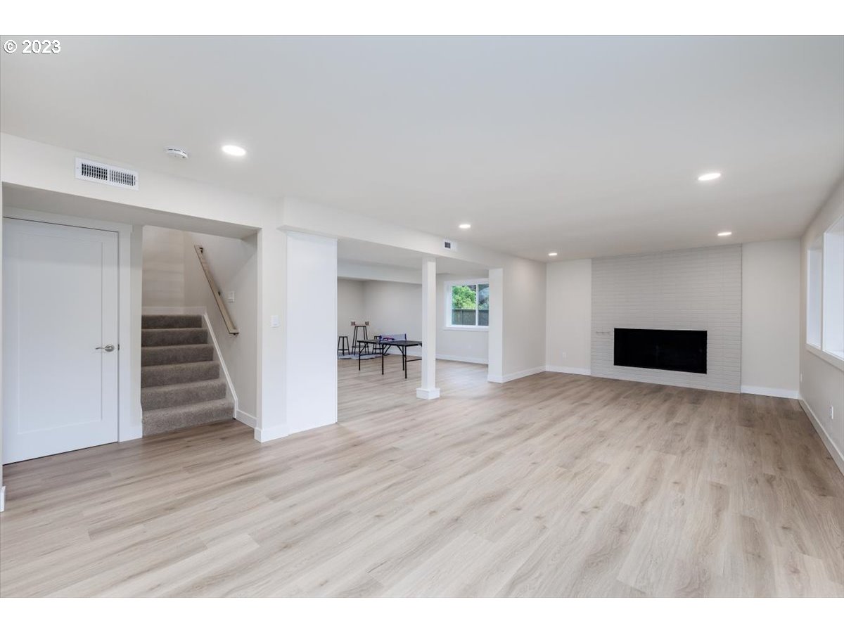 4011 Southwest 43rd Avenue Portland, OR 97221 - Photo 27 of 46 a view of empty room with wooden floor