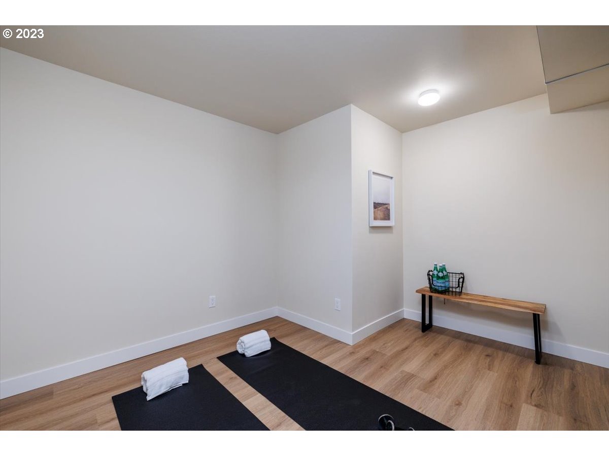 4011 Southwest 43rd Avenue Portland, OR 97221 - Photo 32 of 46 a view of an empty room and wooden floor