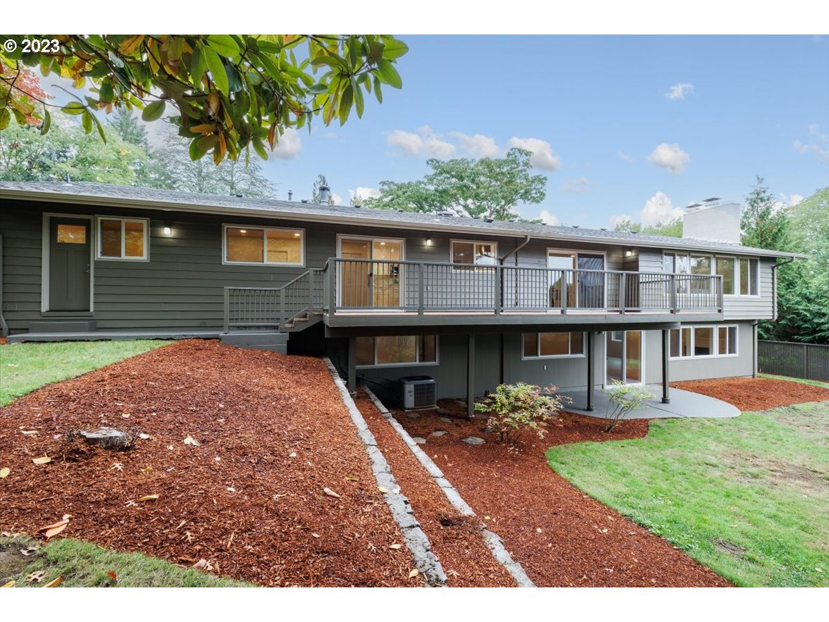4011 Southwest 43rd Avenue Portland, OR 97221 - Photo 34 of 46 a front view of a house with garden