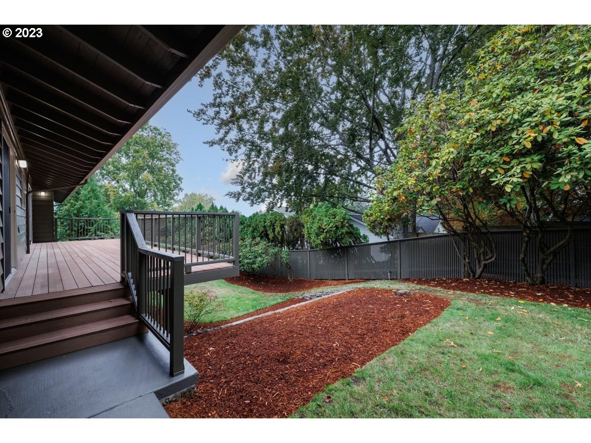 4011 Southwest 43rd Avenue Portland, OR 97221 - Photo 38 of 46 a backyard of a house with lots of green space