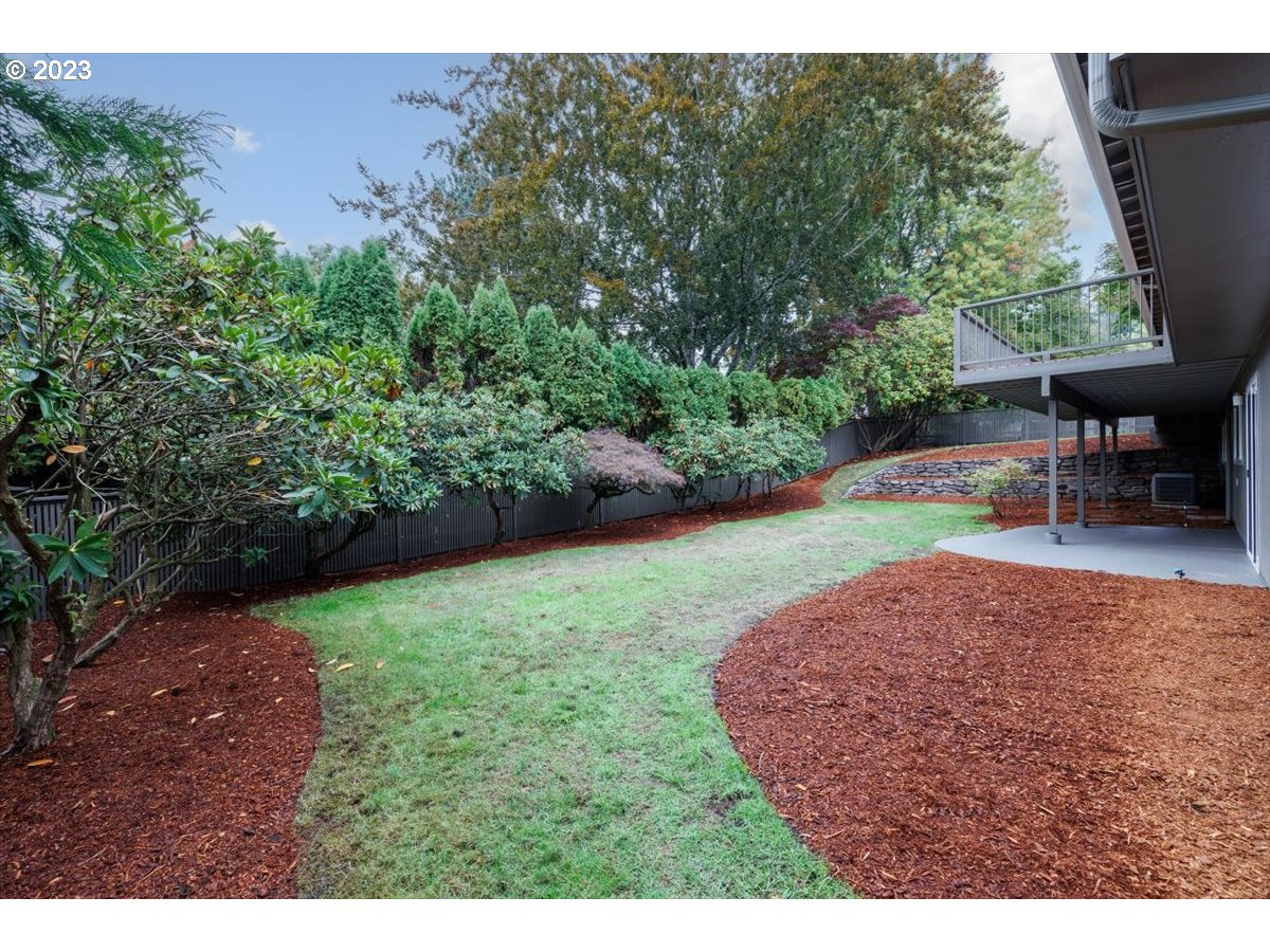 4011 Southwest 43rd Avenue Portland, OR 97221 - Photo 40 of 46 a view of a backyard with furniture