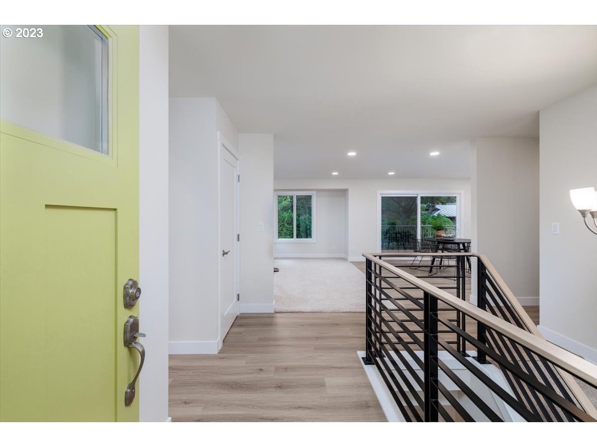 4011 Southwest 43rd Avenue Portland, OR 97221 - Photo 5 of 46 a view of kitchen with furniture and wooden floor