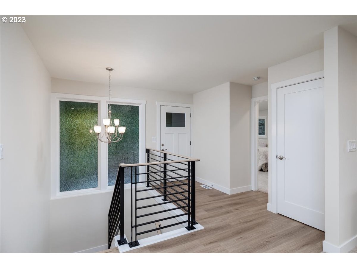 4011 Southwest 43rd Avenue Portland, OR 97221 - Photo 6 of 46 a view of entryway with wooden floor
