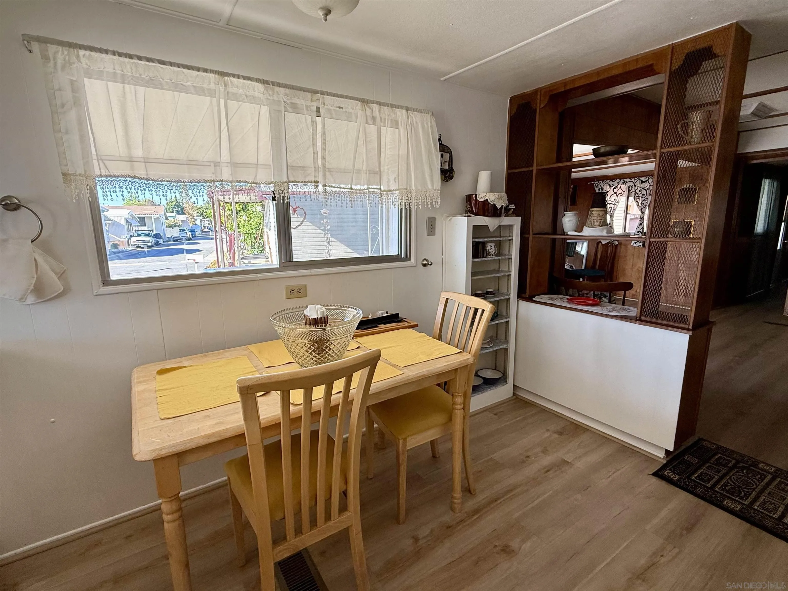 1174 East Main Street El Cajon, CA 92021 - Photo 13 of 23 a view of a dining room with furniture and window