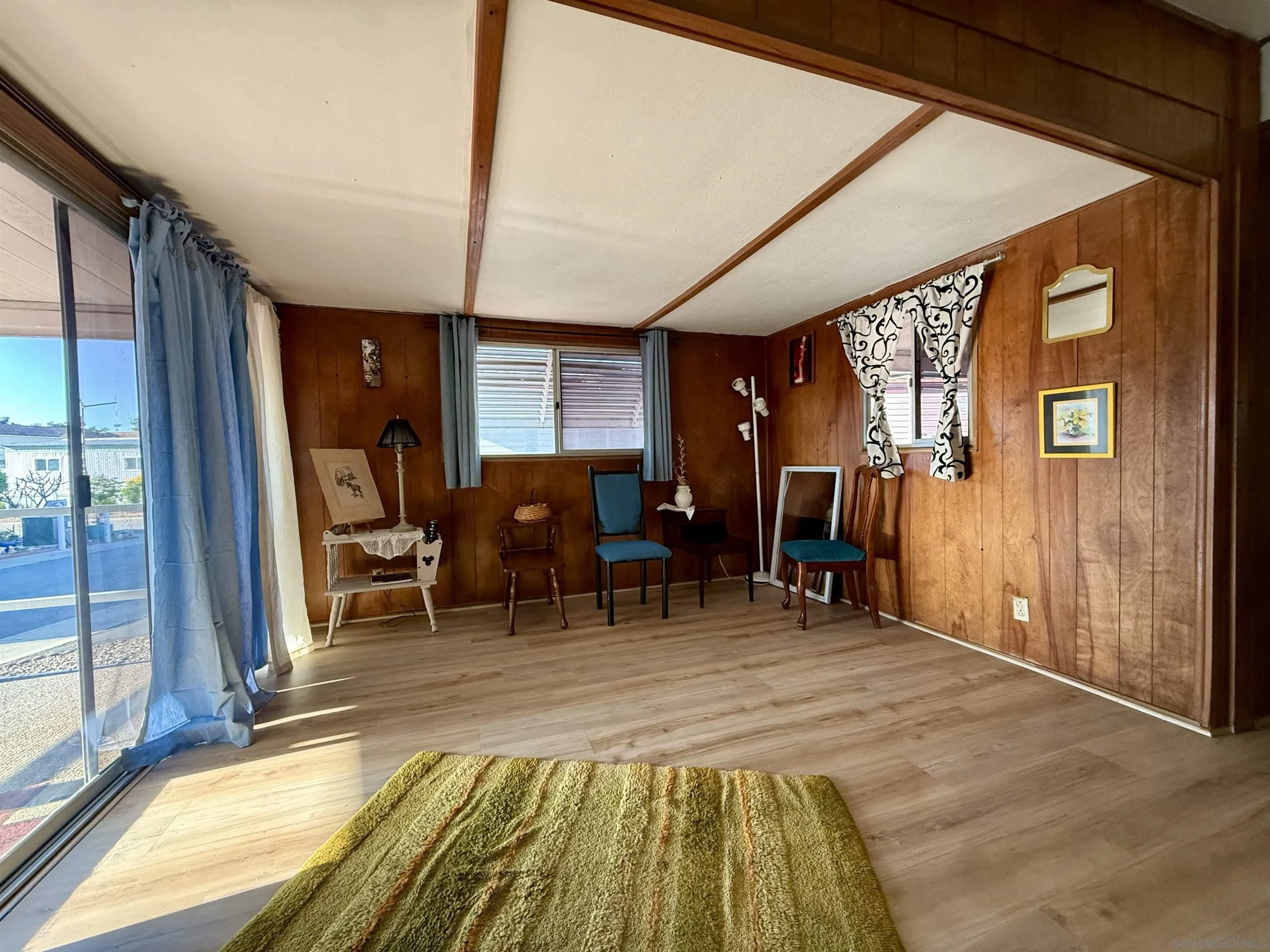1174 East Main Street El Cajon, CA 92021 - Photo 21 of 23 a room with furniture and a large window