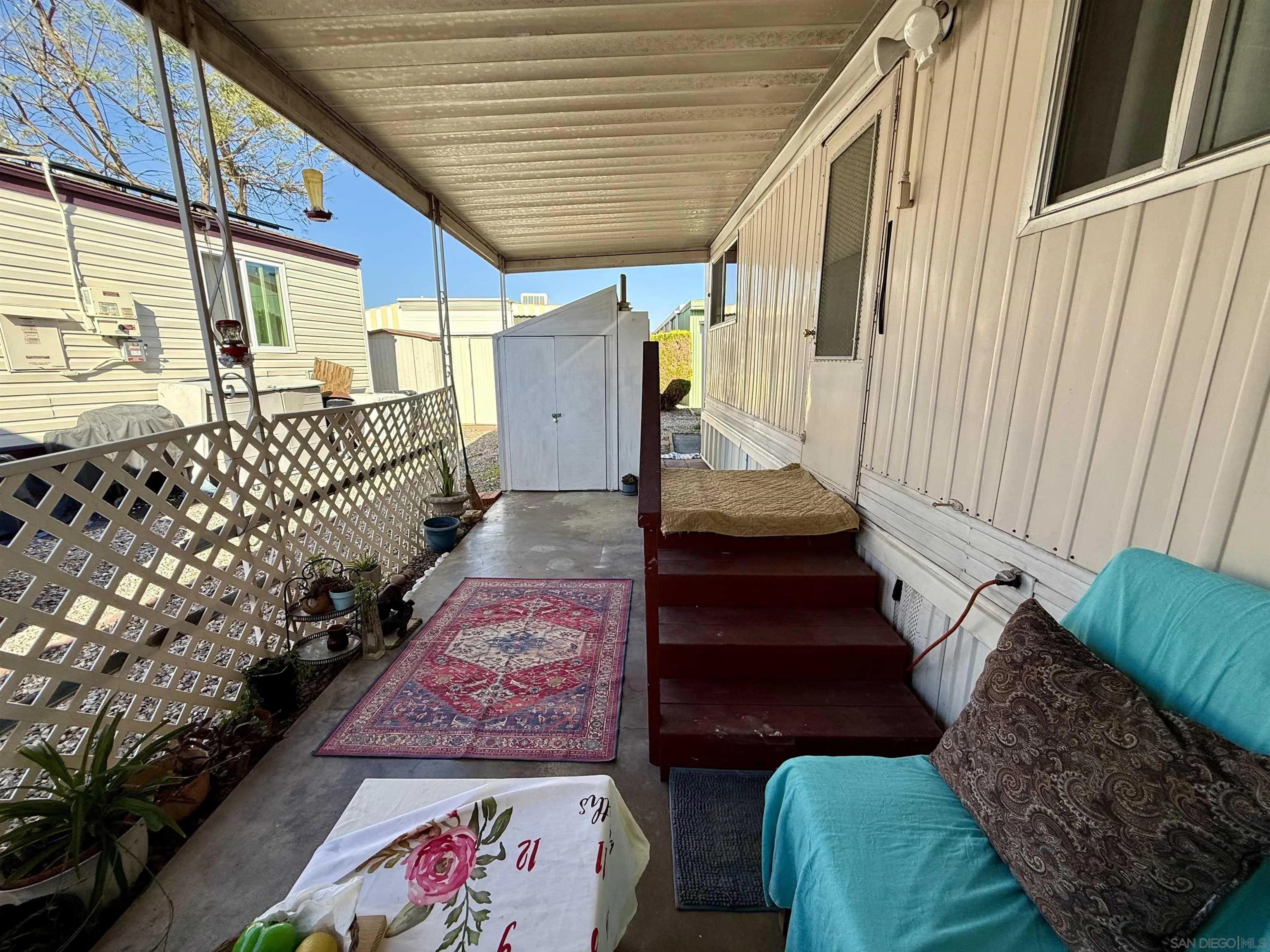 1174 East Main Street El Cajon, CA 92021 - Photo 8 of 23 a view of a porch with furniture