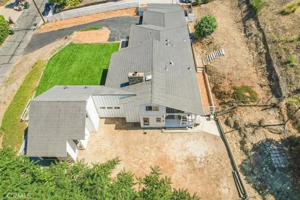 a view of outdoor space and front view of a house