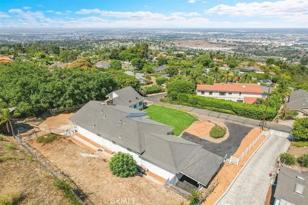 a room with gym equipment and windows