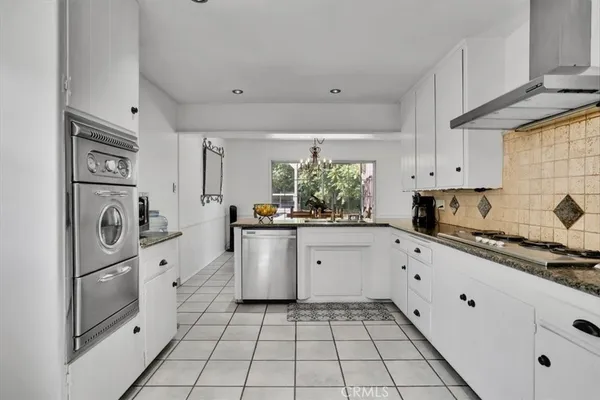 a bedroom with a bed and a table in it