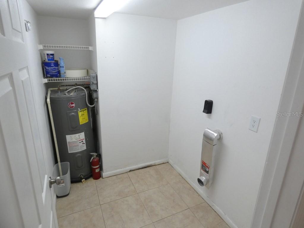 1960 Union Street, Unit 41 Clearwater, FL 33763 - Photo 21 of 45 a view of storage and utility room with washer and dryer