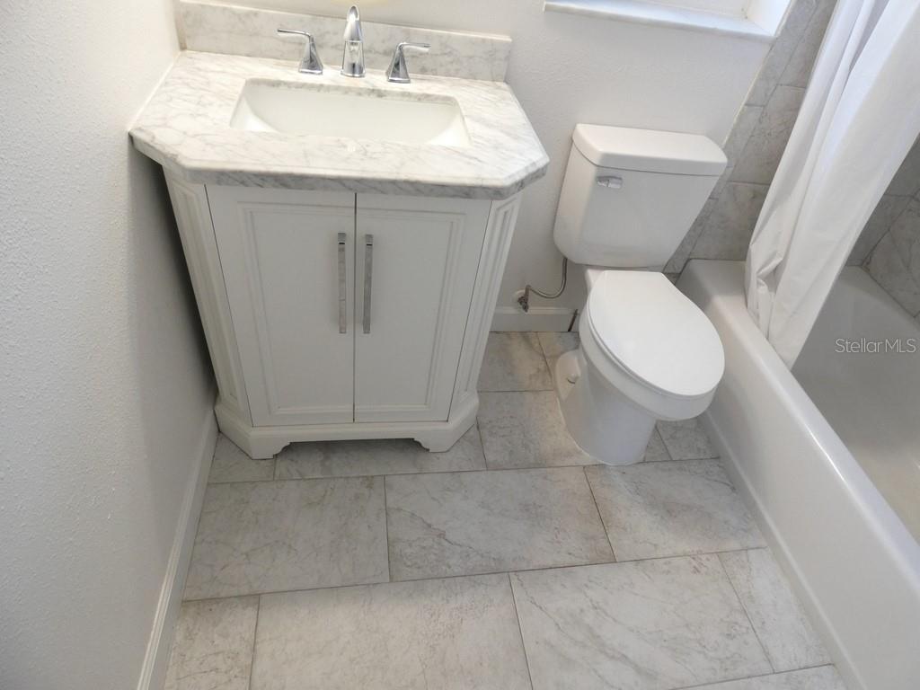 1960 Union Street, Unit 41 Clearwater, FL 33763 - Photo 25 of 45 a bathroom with a sink and a toilet