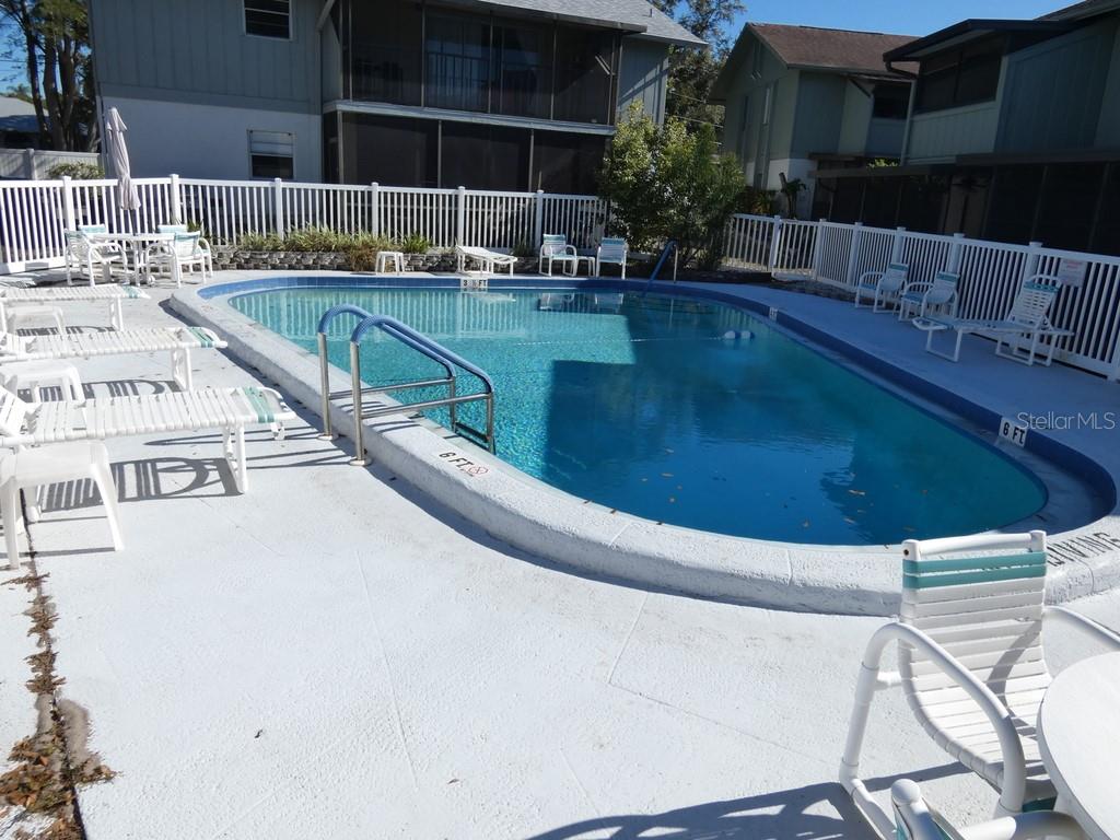 1960 Union Street, Unit 41 Clearwater, FL 33763 - Photo 33 of 45 a view of swimming pool with seating space