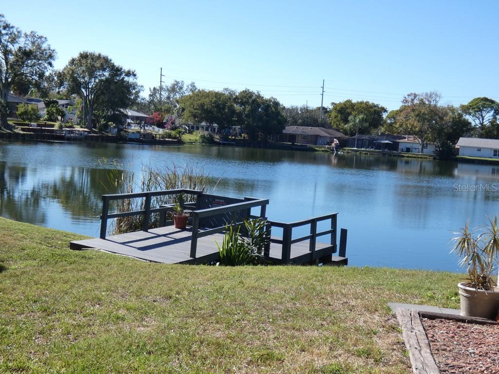 1960 Union Street, Unit 41 Clearwater, FL 33763 - Photo 34 of 45 an outdoor sitting area with lake view