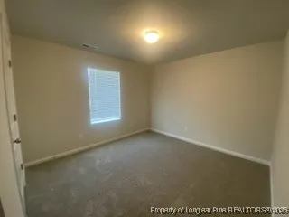 an empty room with an entryway