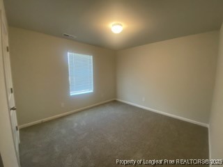 10 Bennington Way Lillington, NC 27546 - Photo 16 of 19 an empty room with a window