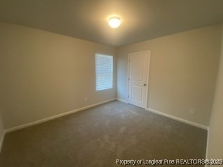 10 Bennington Way Lillington, NC 27546 - Photo 17 of 19 an empty room with an entryway