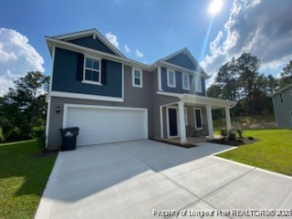 10 Bennington Way Lillington, NC 27546 - Photo 2 of 19 a view of a house with a yard