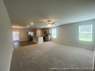 10 Bennington Way Lillington, NC 27546 - Photo 3 of 19 a view of empty room with a kitchen