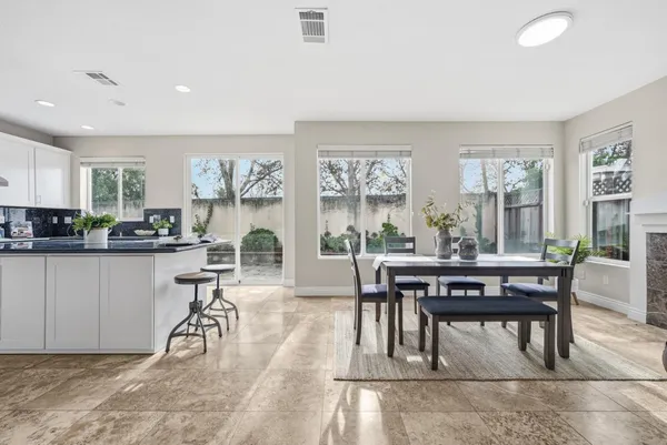 a view of a dining room with furniture