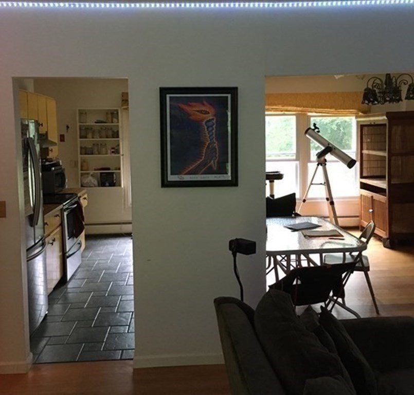 55 West Pelham Road Shutesbury, MA 01072 - Photo 12 of 32 a view of a workspace with furniture and a window