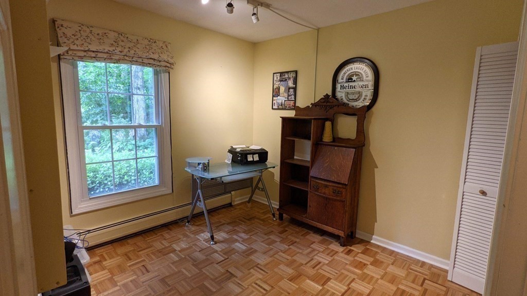 55 West Pelham Road Shutesbury, MA 01072 - Photo 23 of 32 a view of a room with a window and wooden floor