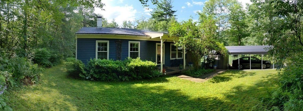 55 West Pelham Road Shutesbury, MA 01072 - Photo 5 of 32 a view of a house with a backyard