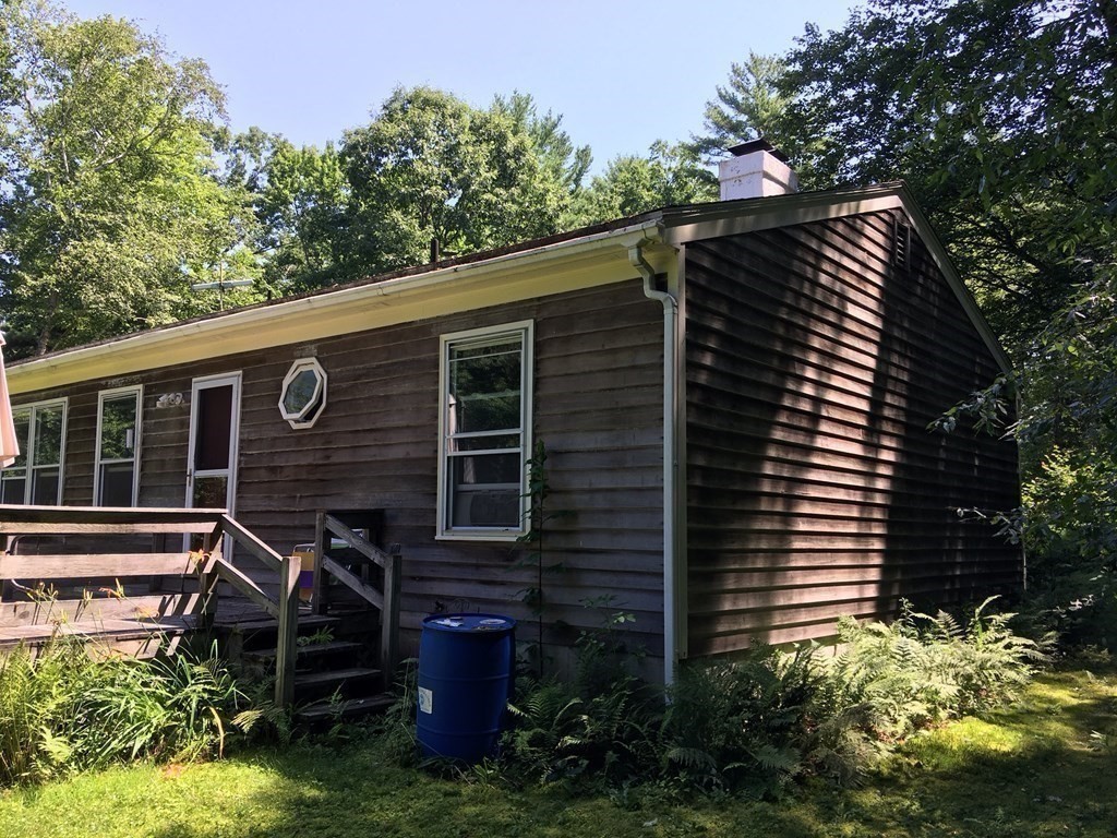 55 West Pelham Road Shutesbury, MA 01072 - Photo 8 of 32 a view of a house with a yard