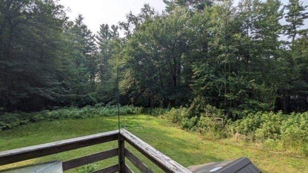 55 West Pelham Road Shutesbury, MA 01072 - Photo 9 of 32 a view of a wooden deck with a yard