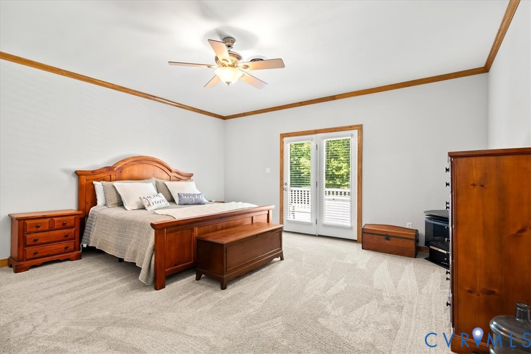 3060 Moyer Road Powhatan, VA 23139 - Photo 36 of 66 Spacious primary bedroom featuring hardwood furnis