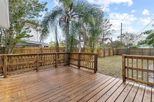 a view of outdoor space with wooden deck