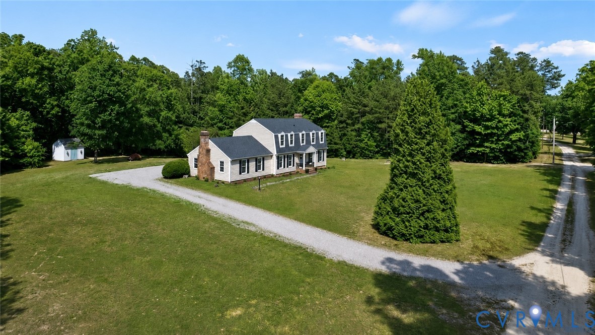 20010 River Road Chesterfield, VA 23838 - Photo 34 of 36 a house with green field in front of it