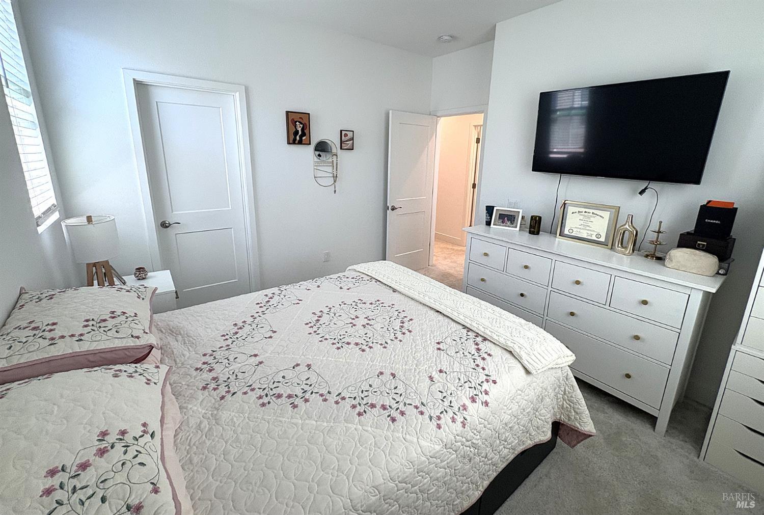 2912 Liscum Street Santa Rosa, CA 95407 - Photo 18 of 25 a bedroom with a bed and a flat screen tv