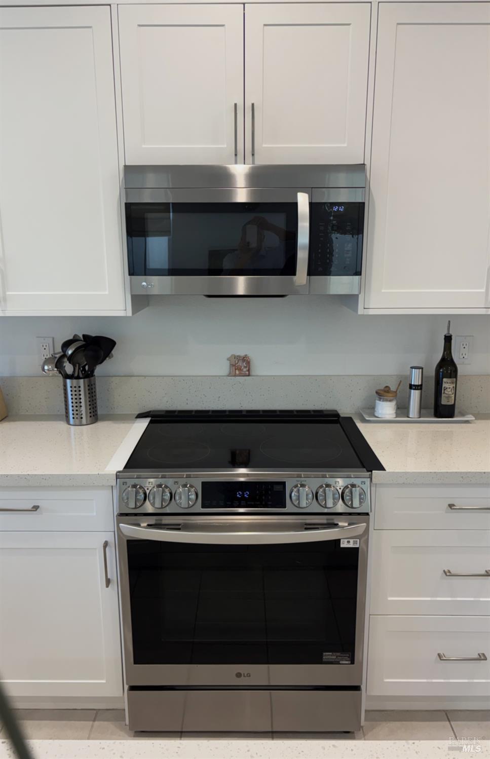 2912 Liscum Street Santa Rosa, CA 95407 - Photo 6 of 25 a stove top oven sitting inside of a kitchen