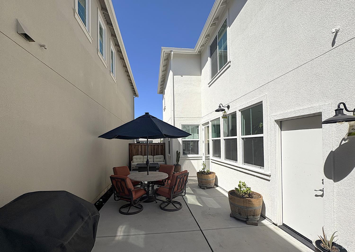 2912 Liscum Street Santa Rosa, CA 95407 - Photo 9 of 25 a dining room with furniture and a potted plant