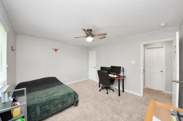 a workspace with furniture and wooden floor