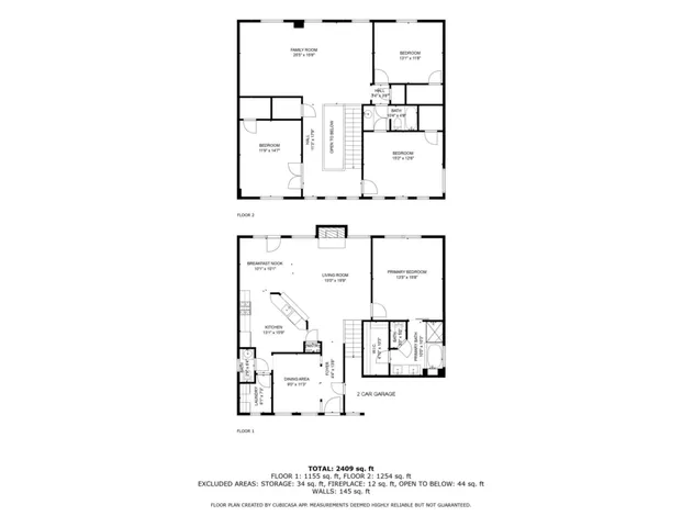 a sign that is sitting in front of flowers