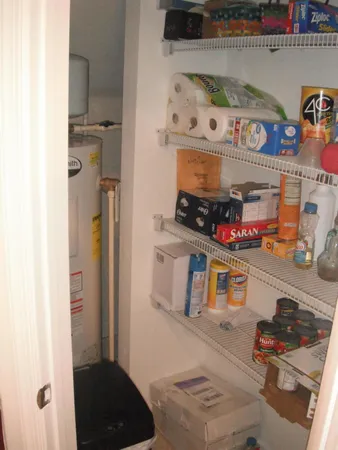 a cabinet with storage and utility