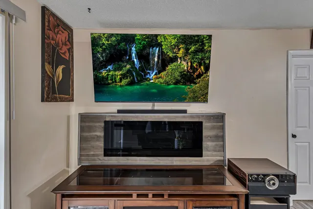 a kitchen with a stove and a microwave