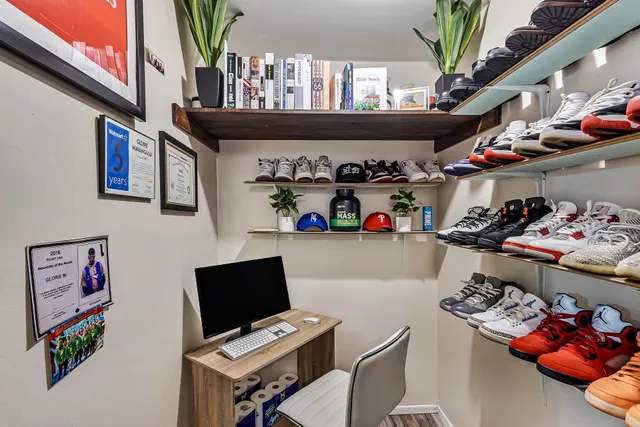 a view of a workspace with furniture