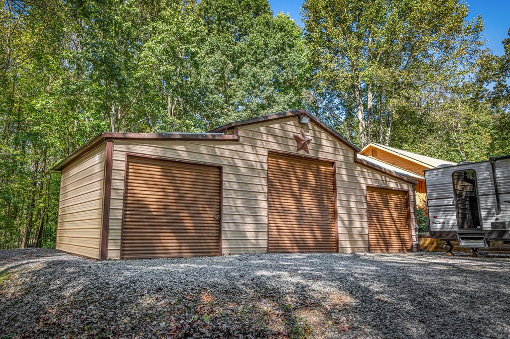 134 Ebenezer Road Ellijay, GA 30536 - Photo 66 of 85 Large metal garage with electricity