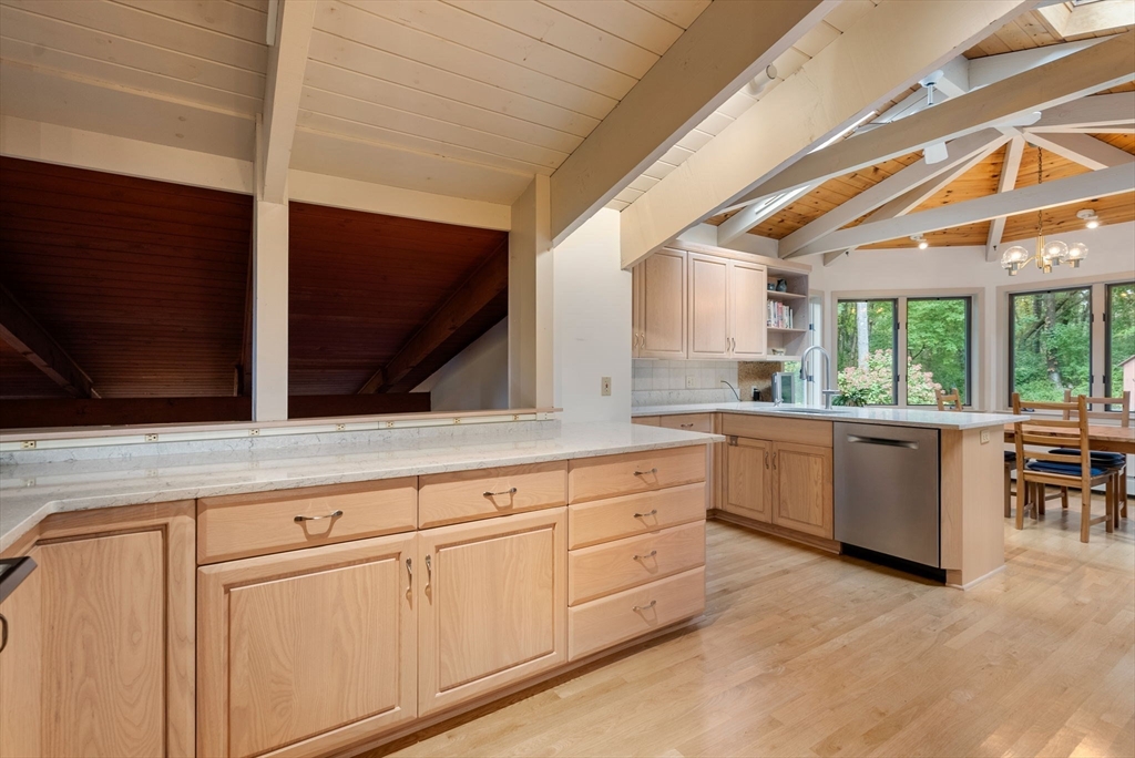 148 Oxbow Road Wayland, MA 01778 - Photo 14 of 32 a kitchen with white cabinets and sink