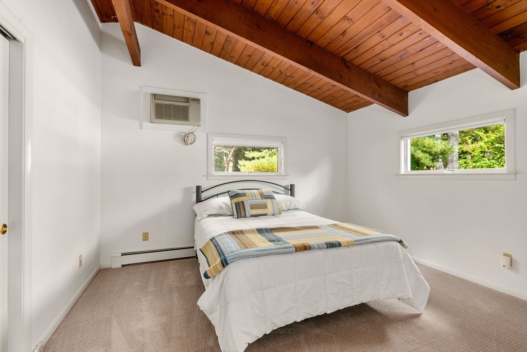 148 Oxbow Road Wayland, MA 01778 - Photo 19 of 32 a bedroom with a bed and a window